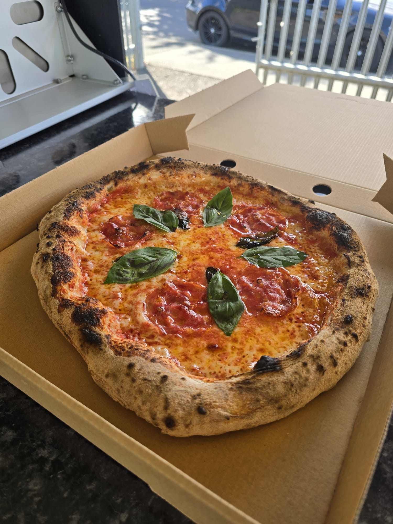 Freshly baked pizza at Pig and Olive Barnstaple
