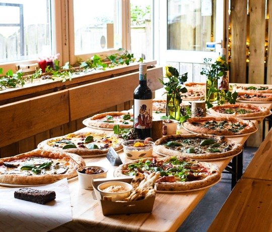 The Winter Den Table set for a Pizza Christmas feast